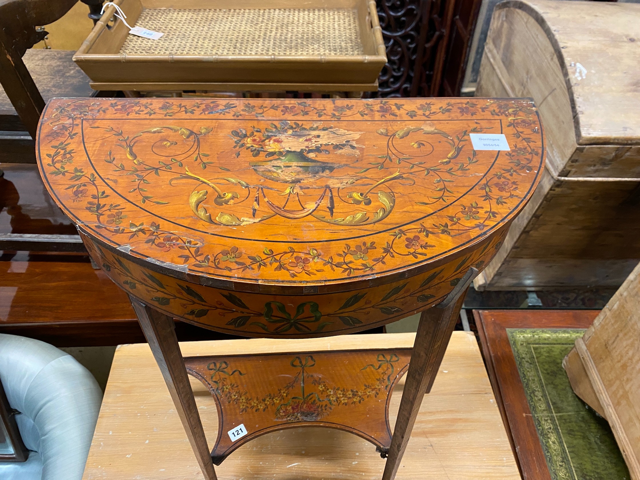 An Edwardian Sheraton Revival painted satinwood D shaped console table, width 61cm, depth 30cm, height 76cm